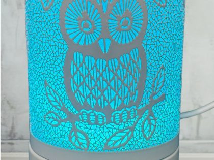 White Owl Lamp Wax Melter rotating through a rainbow of colors, ideal for melting wax and home decor.