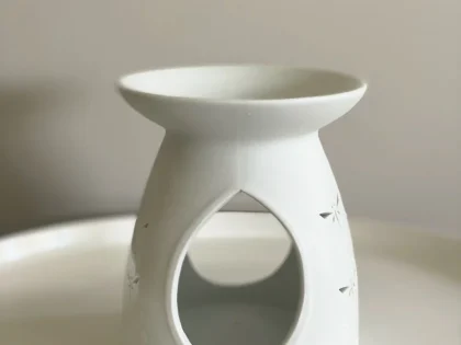 White Porcelain Oil/Wax Burner designed for use with tealight candles, ideal for warming oils or wax melts.