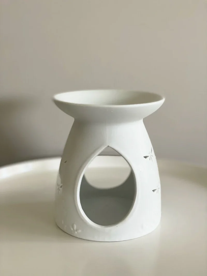 White Porcelain Oil/Wax Burner designed for use with tealight candles, ideal for warming oils or wax melts.